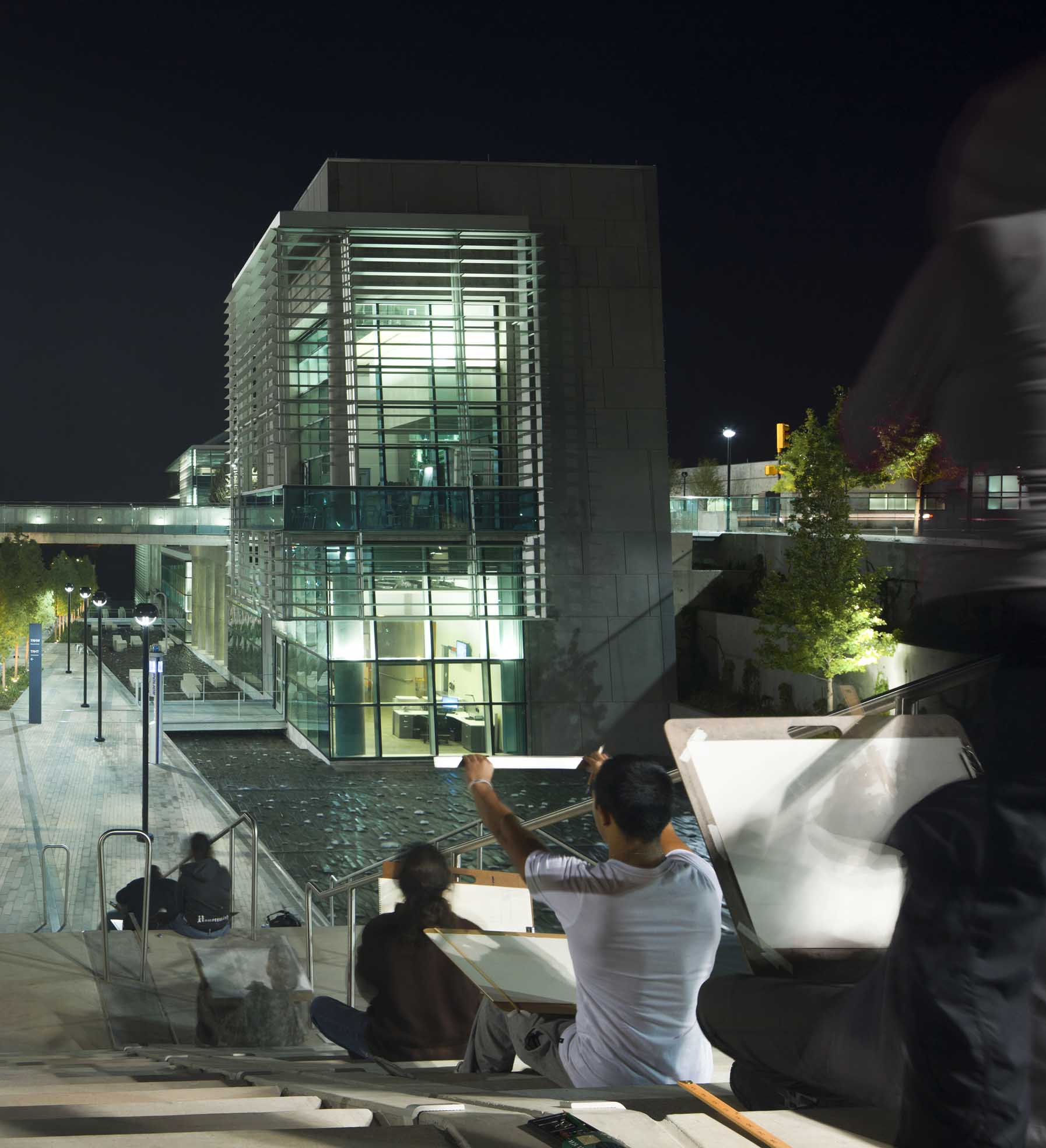 Students sketching at night at Tarrant County College