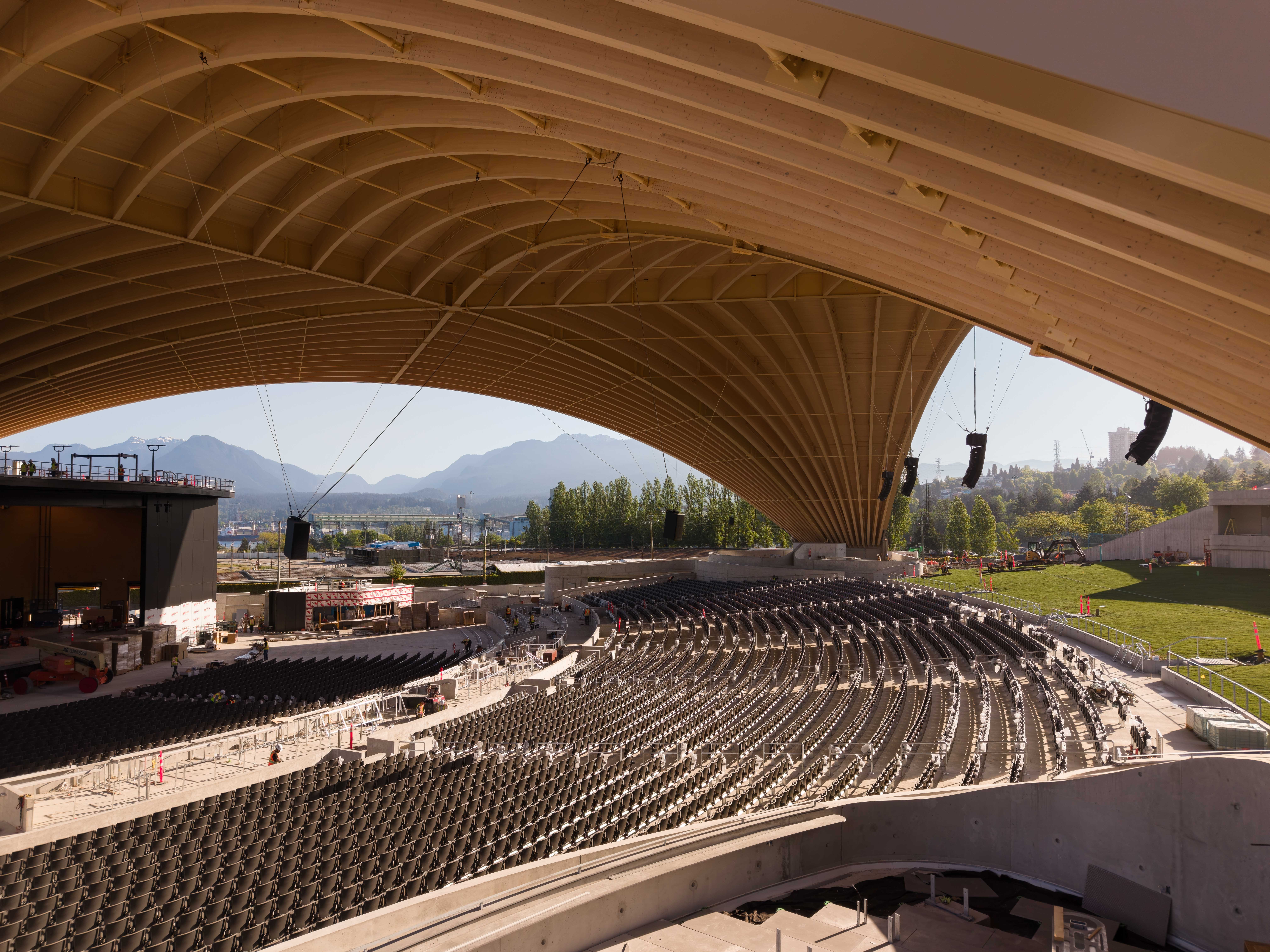 PNE Amphitheatre by Revery Architecture, Vancouver, BC - interior open air view of long-span mass timber roof